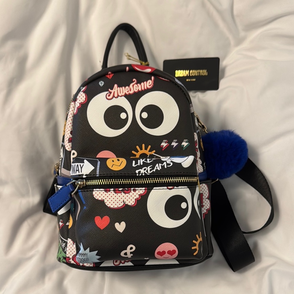 NWT Black Backpack with Fun emojis and Blue fluff Ball